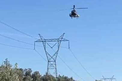 Bursa'da yüksek gerilim hatları helikopterle temizlendi