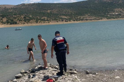 Barajda yüzen 5 kişiye ceza