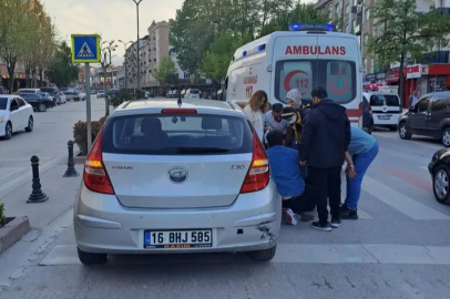 Bursa'da kontrolden çıkan motosiklet otomobile çarptı