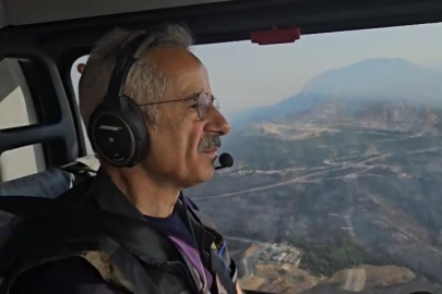 Bakan Uraloğlu, helikopterle yangın bölgesini havadan inceledi