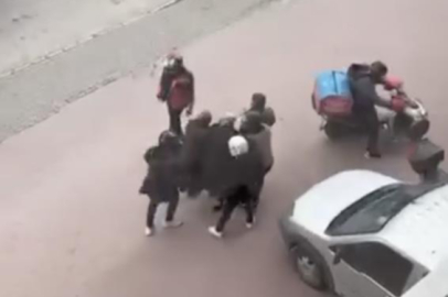 Bursa'da lodosa yakalanan yaşlı kadına kuryeler siper oldu