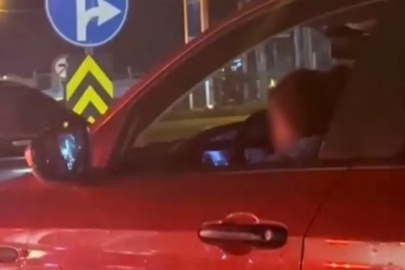 Bursa'da kucağında çocukla araç kullandı