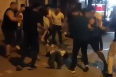 Bursa'da  kadını darp eden adamı mahallelinin linç anları kamerada