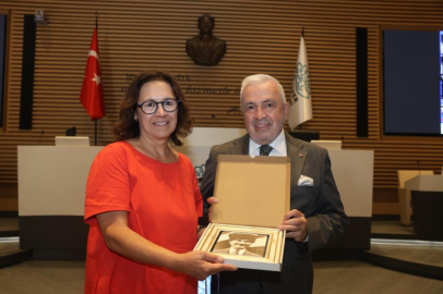 Törende BUÜ, DAÜ ve ÜSİGED yöneticileri de hazır bulundu.