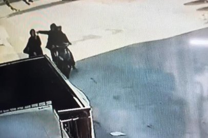 Bursa'da  telefonla konuşurken kapkaça uğradı