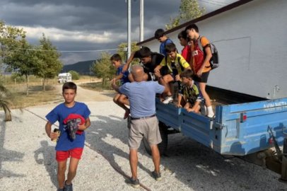 Bursa'da çocuklar için traktörünü spora sürüyor